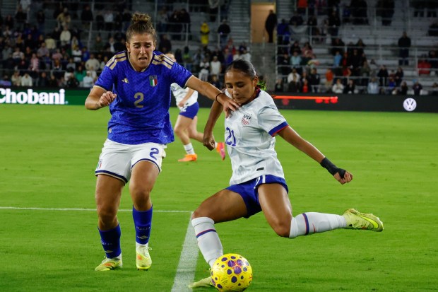 US Women's National Team midfielder Alyssa Thompson takes a shot...