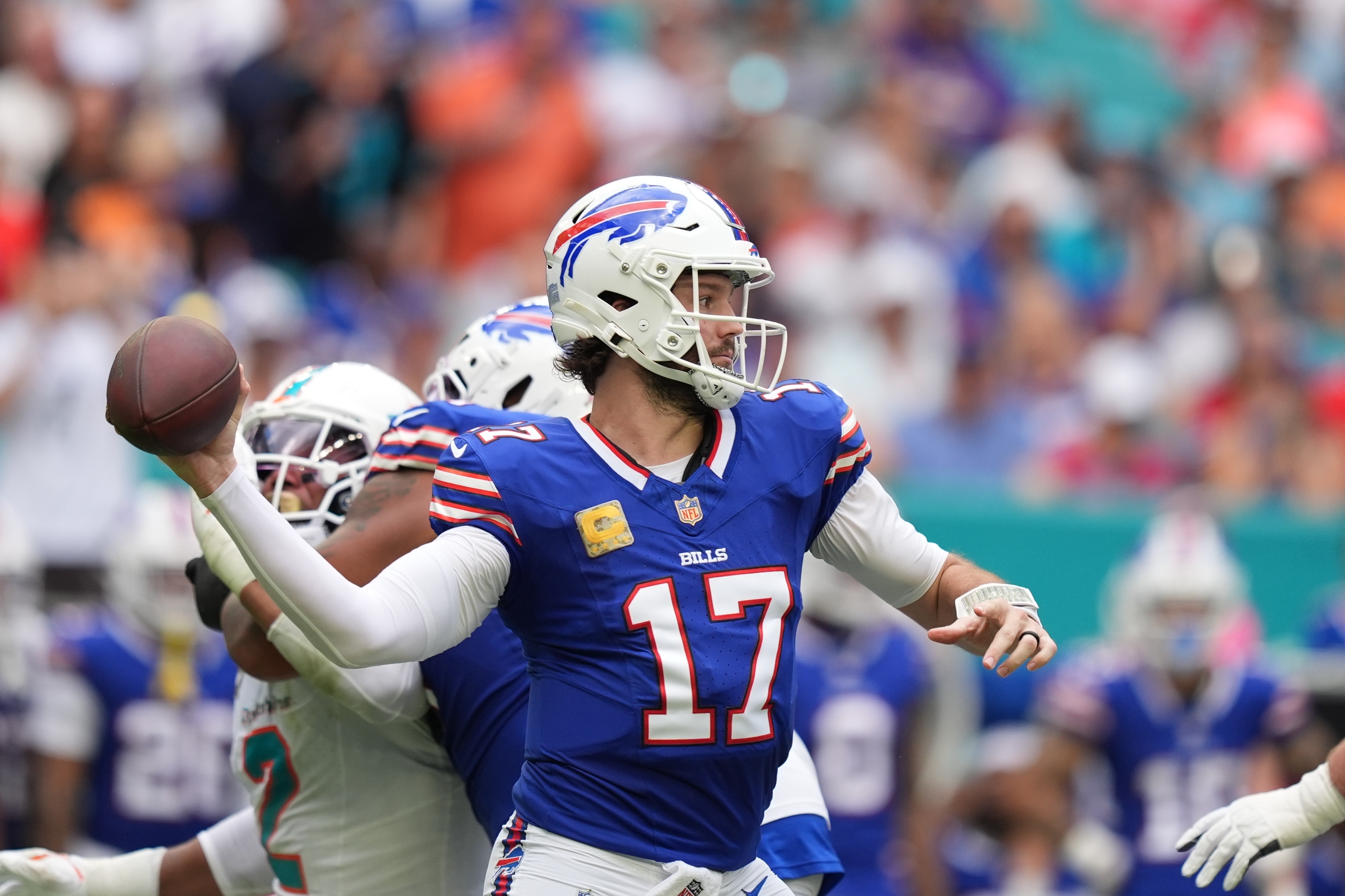 Buffalo Bills' Josh Allen throws during the first half of an NFL football game against the Miami Dolphins, Sunday, Nov. 9, 2025, in Miami Gardens, Fla. (AP Photo/Rebecca Blackwell)