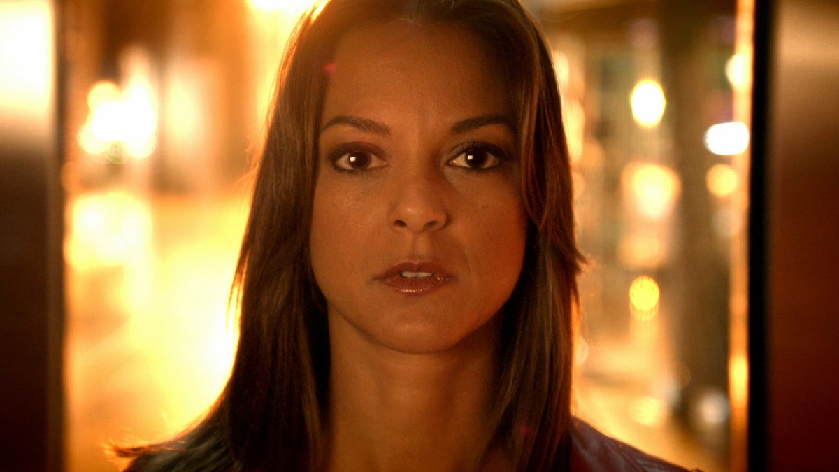 A still of Eva LaRue in an episode of "CSI: Miami"