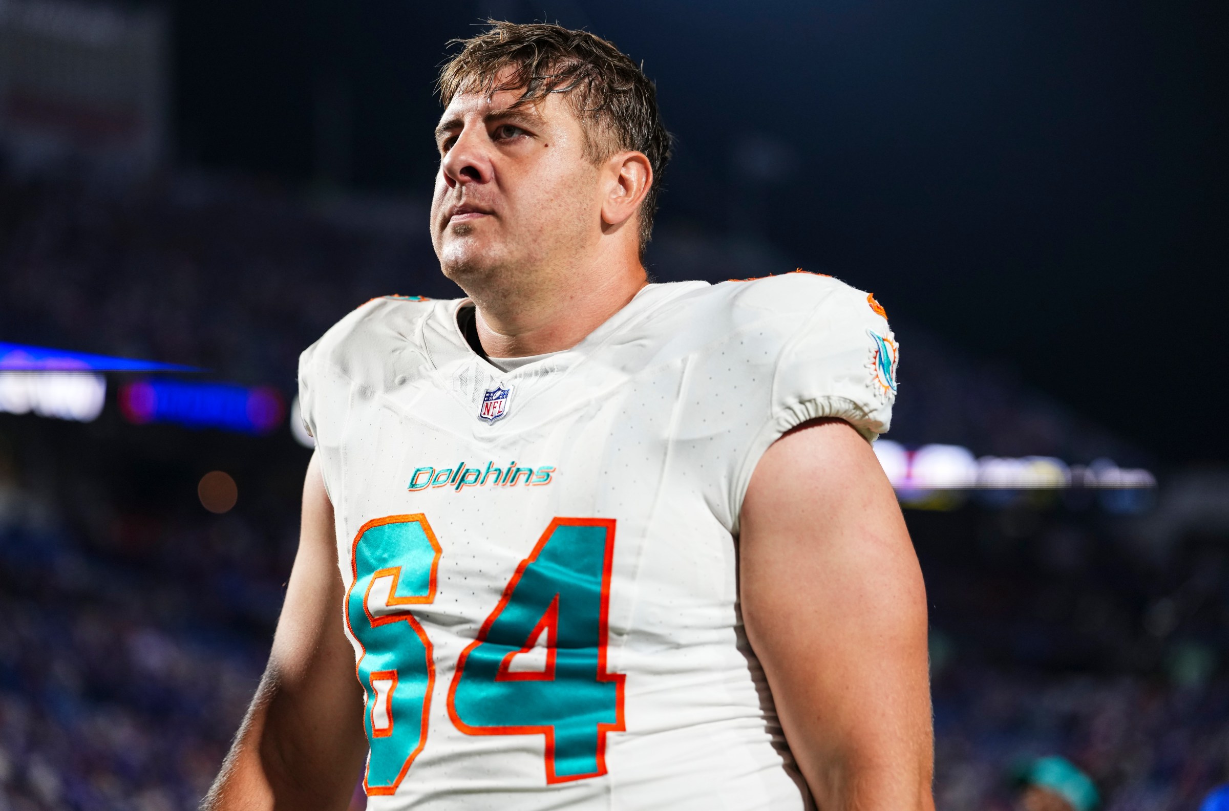 ORCHARD PARK, NY - SEPTEMBER 18: Daniel Brunskill #64 of the Miami Dolphins walks off of the field after an NFL football game against the Buffalo Bills at Highmark Stadium on September 18, 2025 in Orchard Park, New York. (Photo by Cooper Neill/Getty Images)