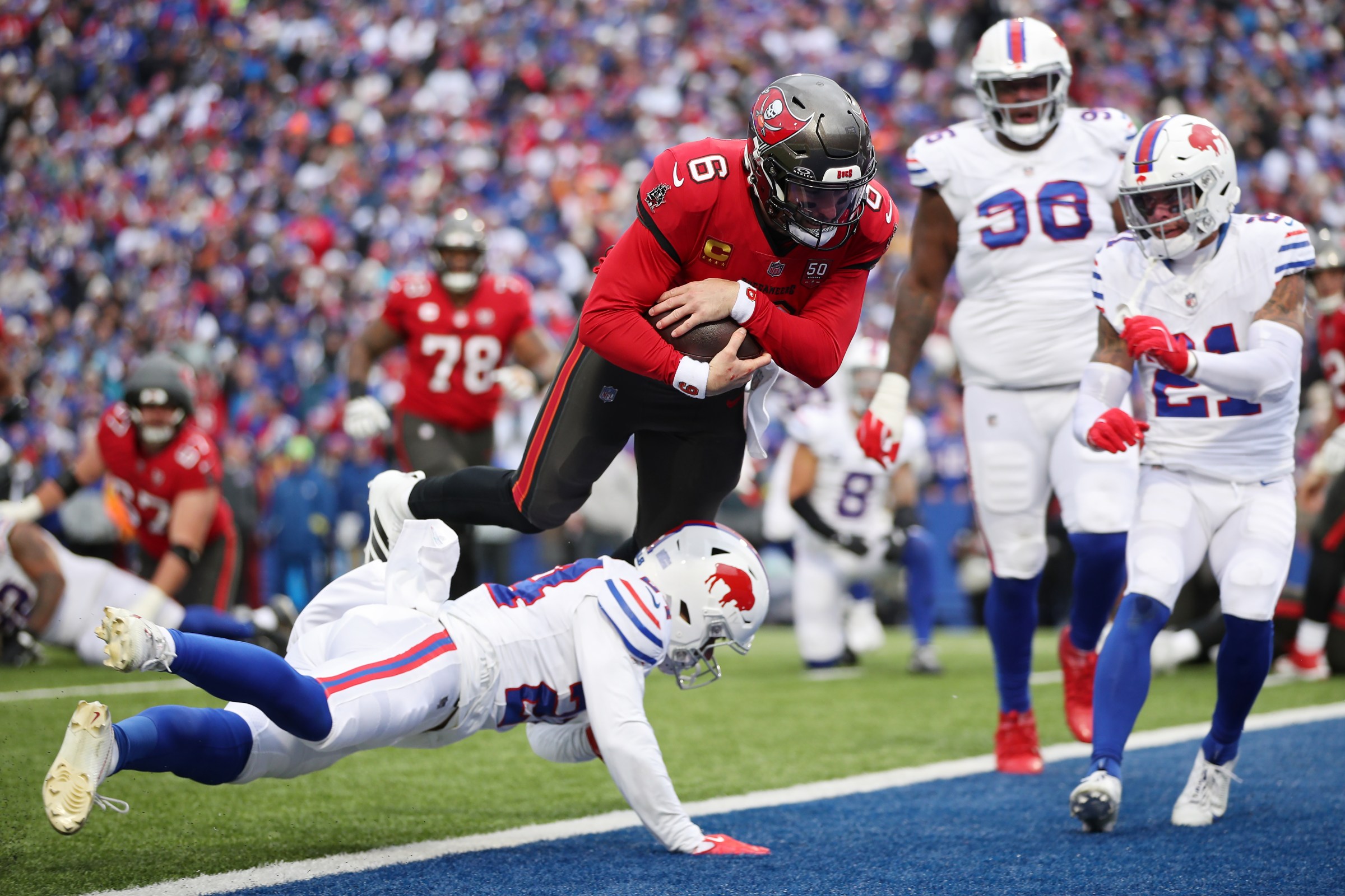 ORCHARD PARK, NEW YORK - NOVEMBER 16: Baker Mayfield #6 of the Tampa Bay Buccaneers scores a touchdown during the second quarter against the Buffalo Bills at Highmark Stadium on November 16, 2025 in Orchard Park, New York. (Photo by Bryan M. Bennett/Getty Images)
