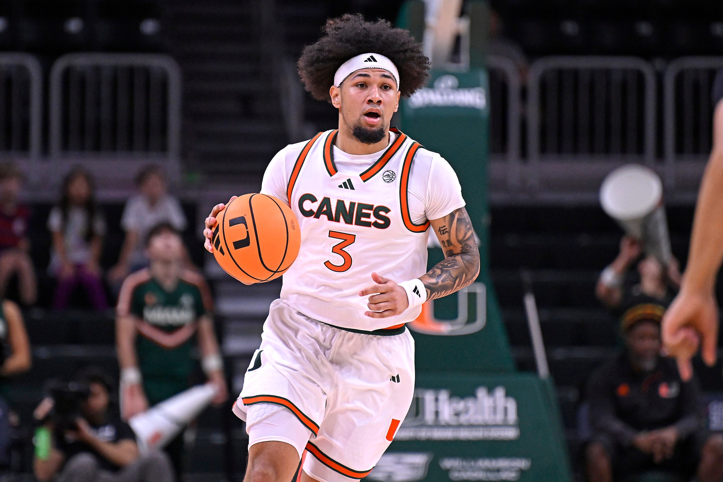 CORAL GABLES, FL - NOVEMBER 23: Miami guard Tre Donaldson (3) brings the ball up court in the first half as the Miami Hurricanes faced the Delaware State Hornets on November 23, 2025, at the Watsco Center in Coral Gables, Florida. (Photo by Samuel Lewis/Icon Sportswire via Getty Images)