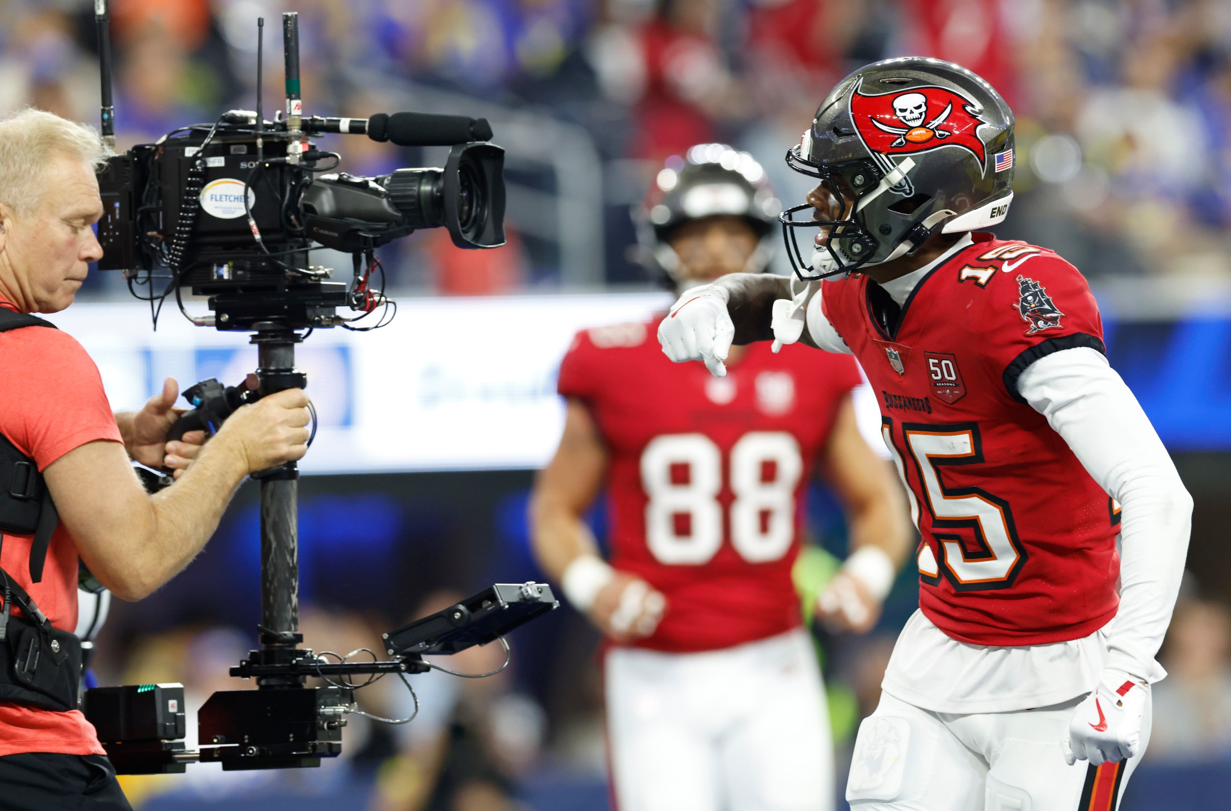 INGLEWOOD, CALIFORNIA - NOVEMBER 23: Tez Johnson #15 of the Tampa Bay Buccaneers celebrates after scoring a touchdown against the Los Angeles Rams during the second quarter in the game at SoFi Stadium on November 23, 2025 in Inglewood, California. (Photo by Ronald Martinez/Getty Images)