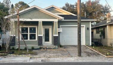 A utility pole currently sits in an under construction driveway at the residence of Sheria Baker in Tampa. (Spectrum News/Fadia Patterson)