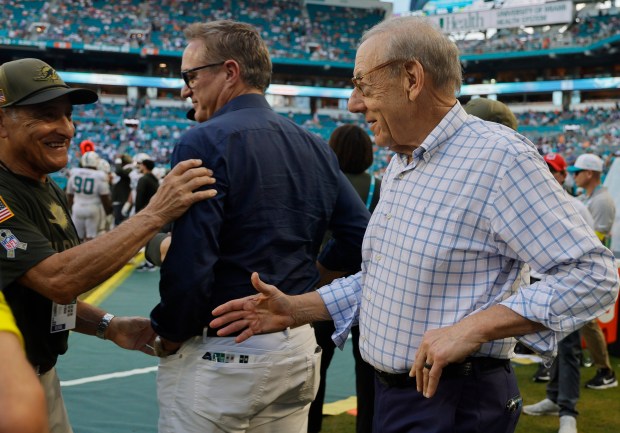 Miami Dolphins owner Stephen Ross, right, and CEO Tom Garfinkel...
