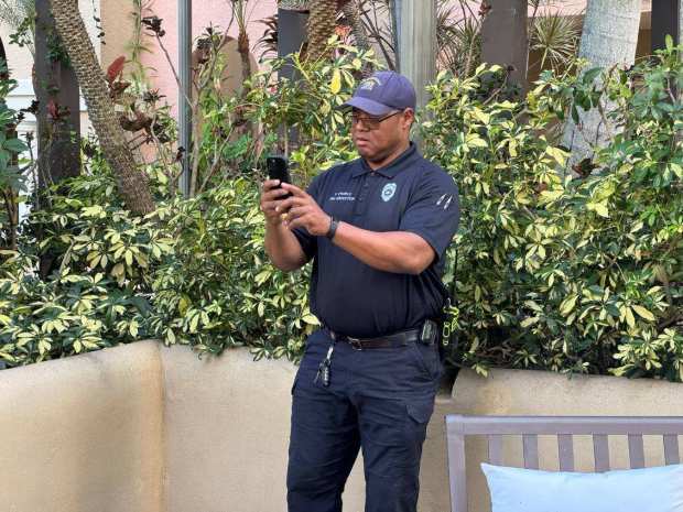 Fire Inspector Cedric Daniels checks the radio signal strength at a residential high-rise tower in downtown Fort Lauderdale on Wednesday. (City of Fort Lauderdale/Courtesy)