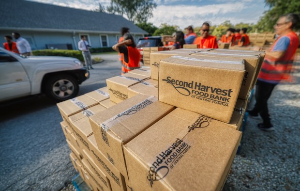 Food giveaway for 350 families at Friends Community Church on Dean Road in Orlando, hosted by Maxwell Frost, Orange County Commissioner Maribel Cordero, and Second Harvest Food Bank, on Friday, Nov. 7, 2025. (Ricardo Ramirez Buxeda/Orlando Sentinel)