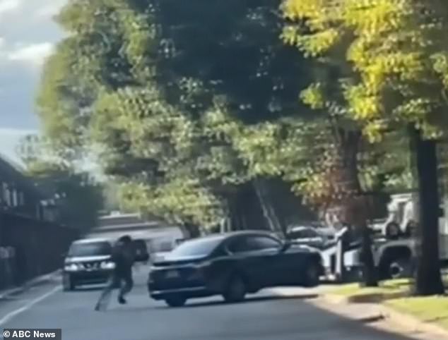 As the dad pursued the tow truck on foot, he yanked open the back door. His daughter later fell out of the car