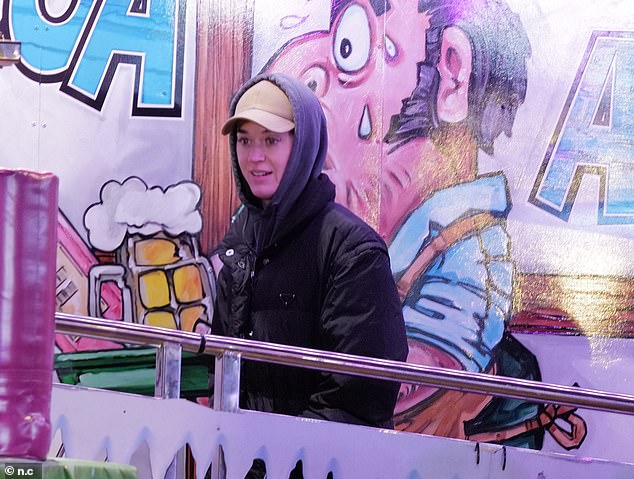 The pair split in July after six years together, but have reunited for a Christmasouting in the UK with their six-year-old daughter Daisy Dove