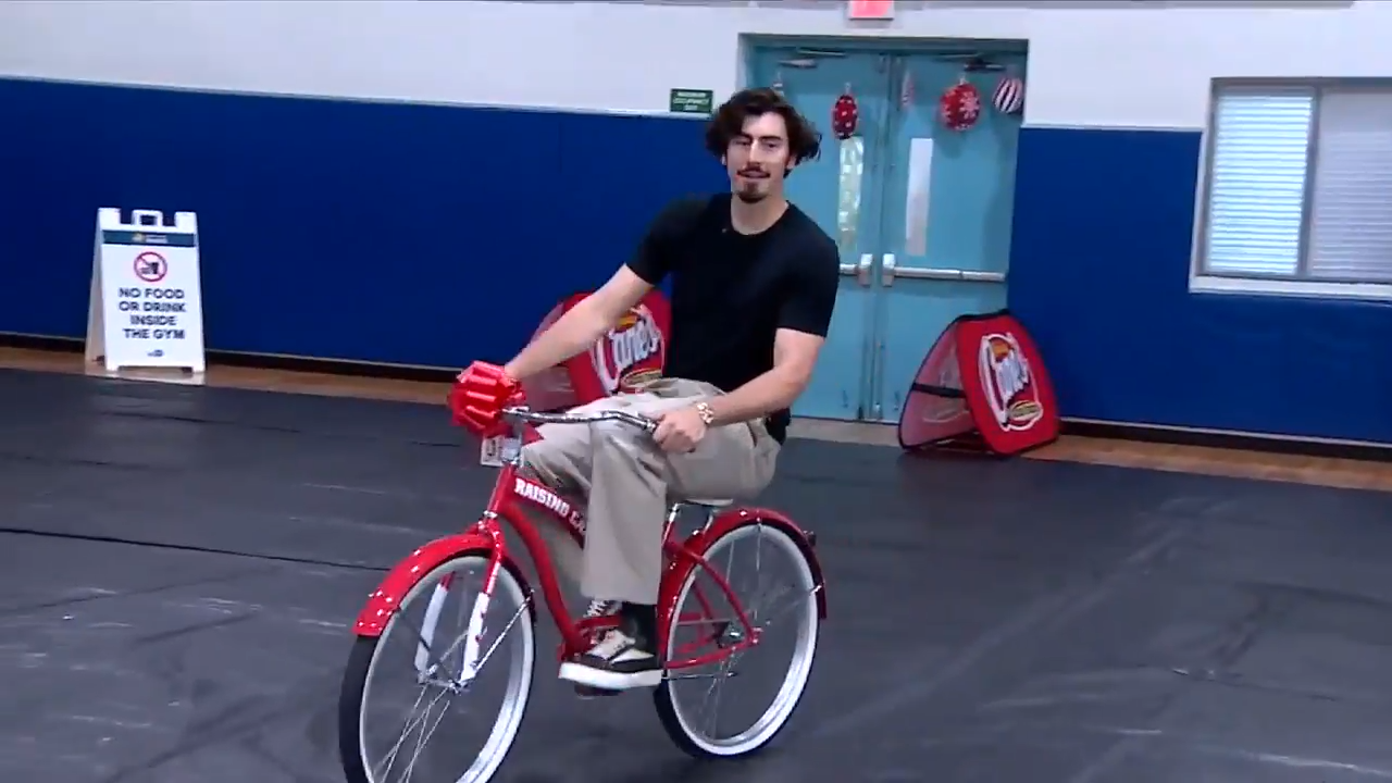 Heat forward Jaime Jaquez Jr. teams up with Raising Cane’s to donate bicycles, helmets to Boys & Girls Club of Miami-Dade - WSVN 7News | Miami News, Weather, Sports