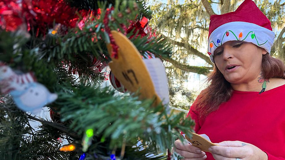 Angela Silas said she is well aware of the financial burden the holidays puts on families in her neighborhood. That is the reason she started a fundraiser 11 years ago to help underserved children who otherwise may not get Christmas gifts in Osceola County. (Spectrum News/Jordan Mead)