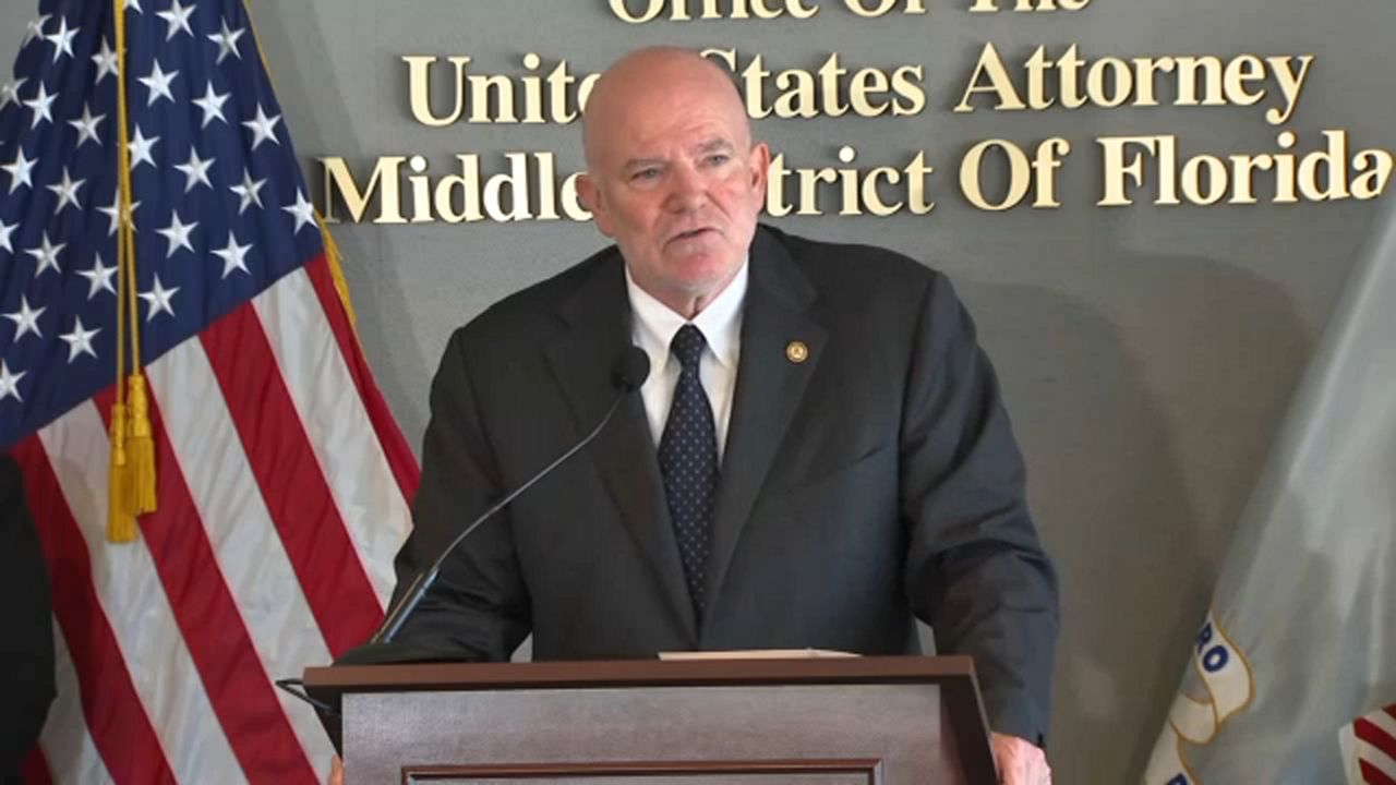 U.S. Attorney Gregory W. Kehoe talks to reporters Friday about the arrests. (Spectrum News)