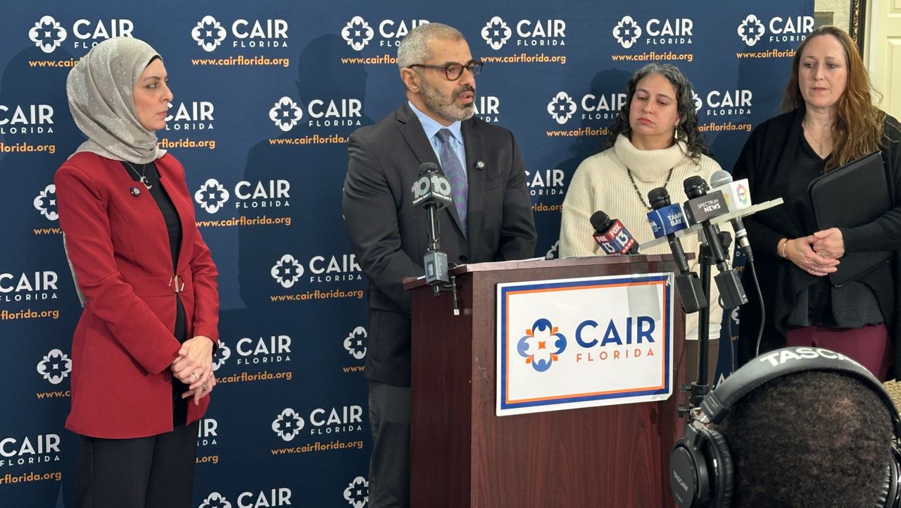 Omar Saleh, Esq (at microphone) and other CAIR leaders speak to reporters on Tuesday. (Spectrum News/Fallon Silcox)