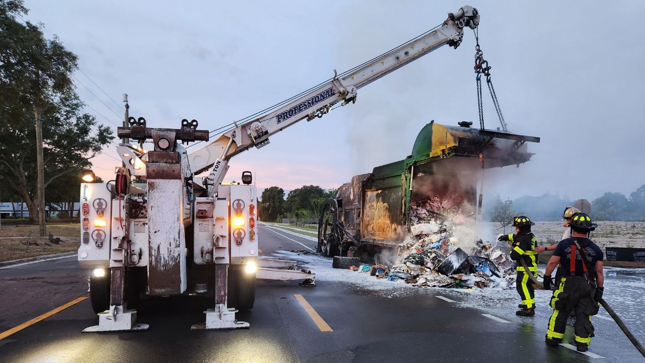 A Hillsborough County garbage truck is seen in the aftermath of a fire that officials say was likely caused by a lithium-ion battery that was not disposed of properly. (Photo: Hillsborough County Fire Rescue)