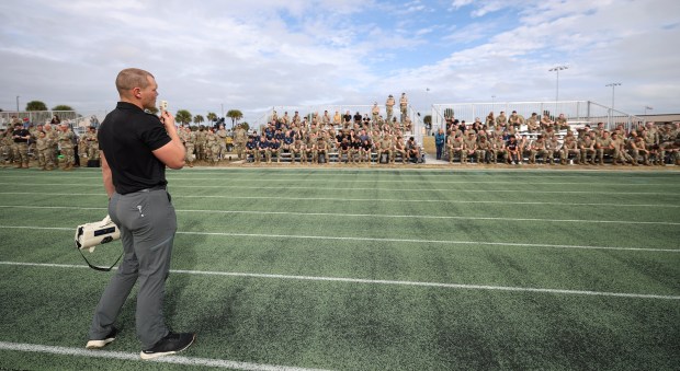 Coach Adam Whisler addresses the competitors during the first day of events for the Space Force Guardian Arena at Patrick SFB, on Monday, December 8, 2025. (Ricardo Ramirez Buxeda/Orlando Sentinel)