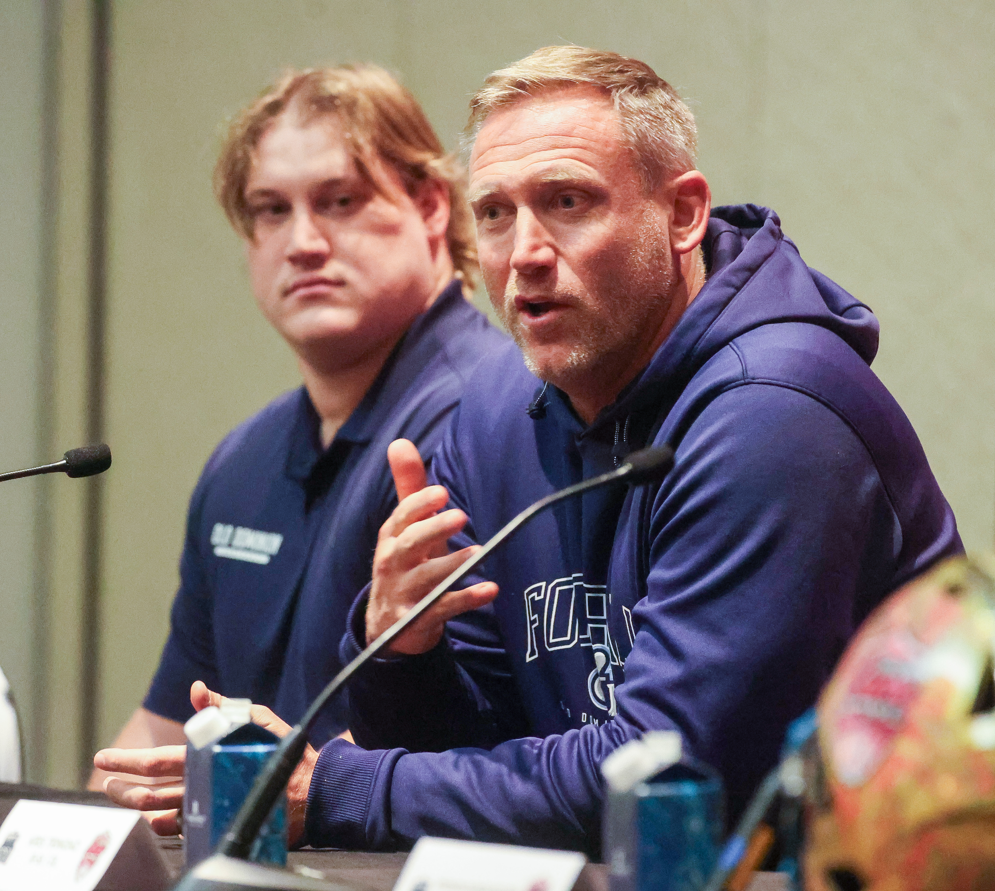 Head coach Ricky Rahne of Old Dominion, with Zach Barlev,...