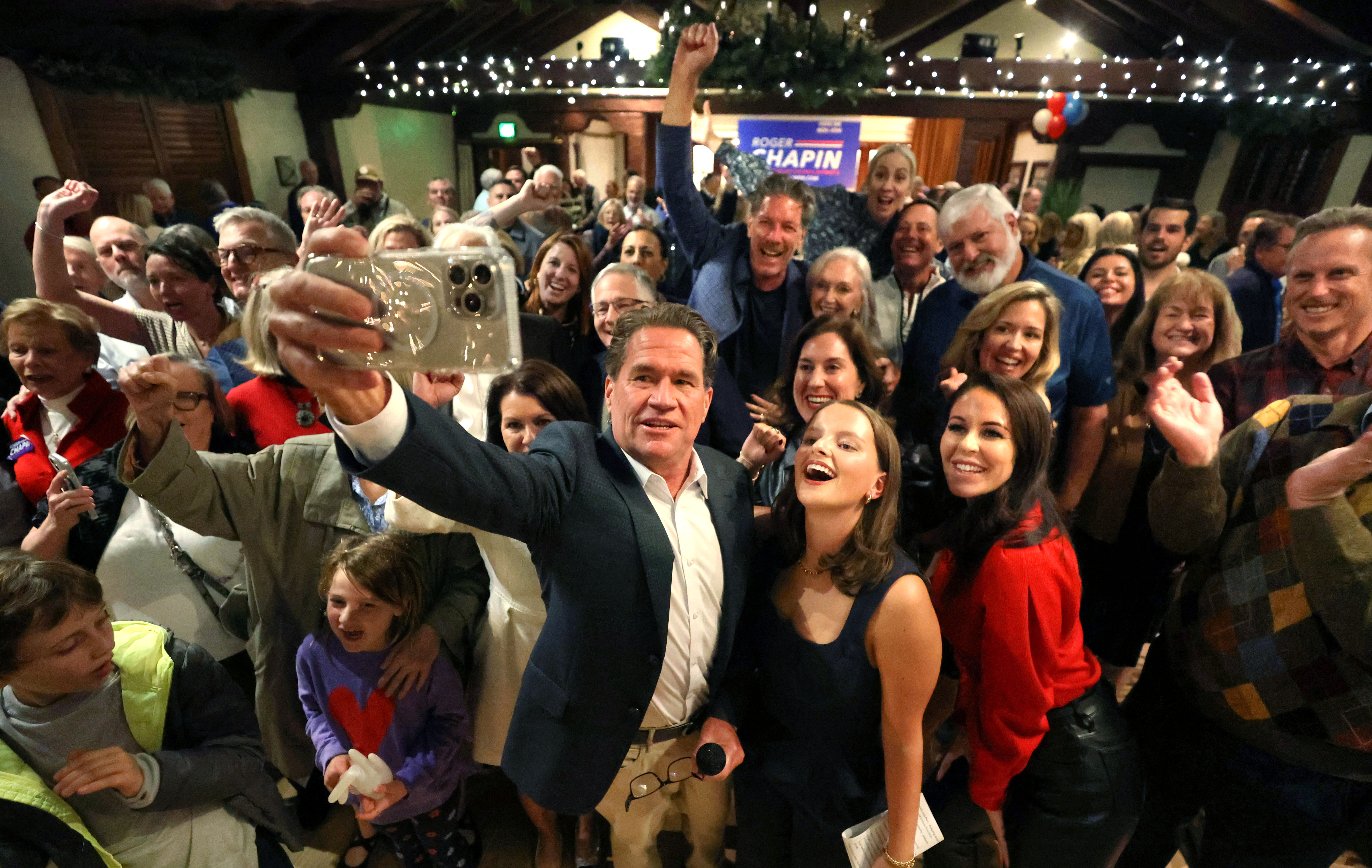 City of Orlando District 3 Commissioner-elect Roger Chapin celebrates his...