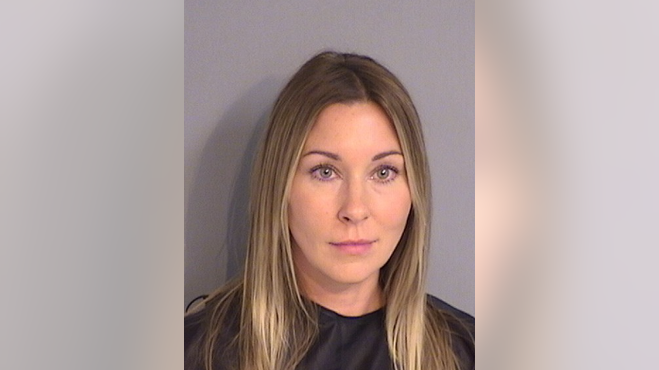 Woman arrested after pushing child underwater at Kissimmee pool, deputies say