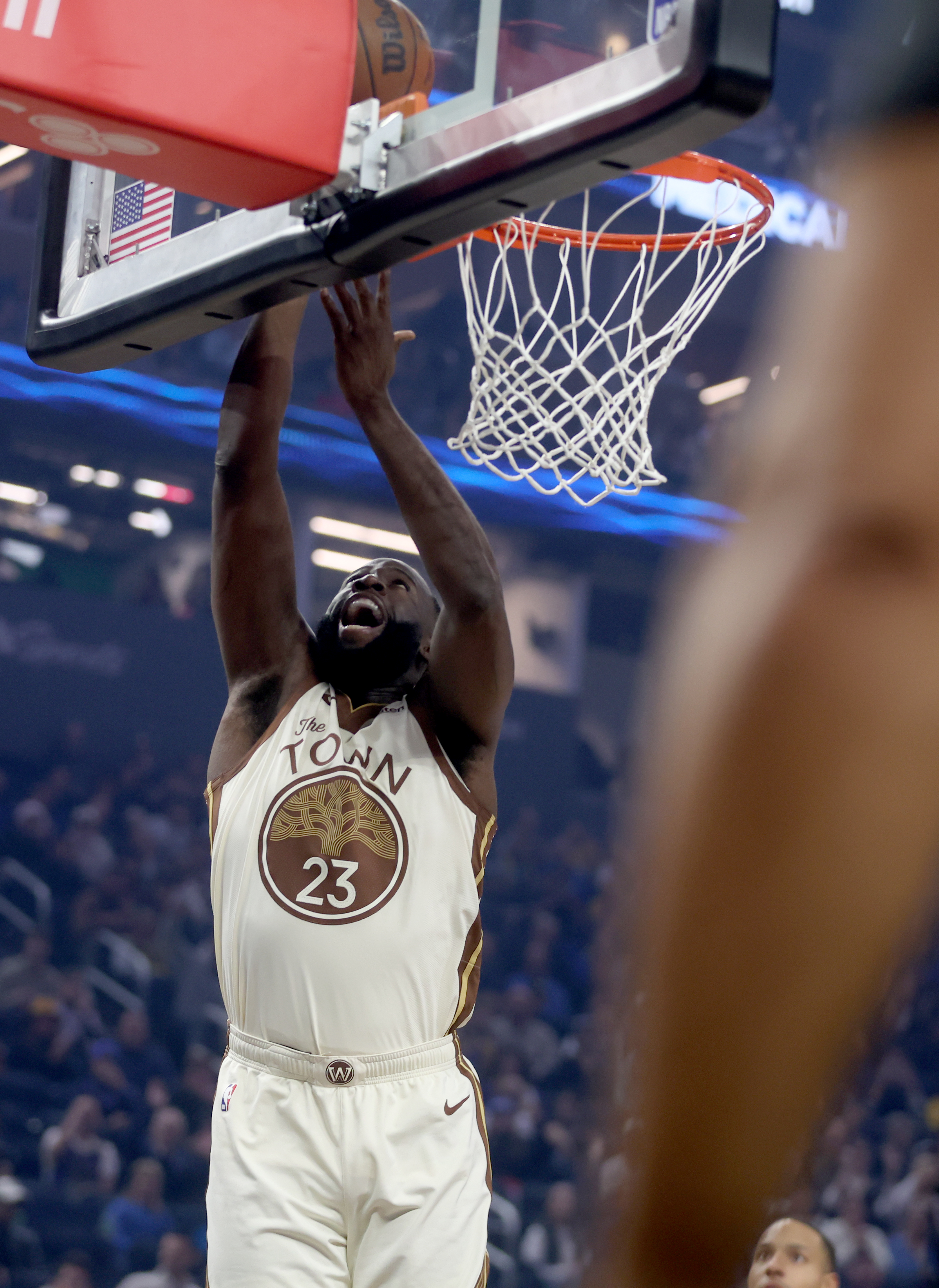 Golden State Warriors’ Draymond Green #23 makes a basket in...