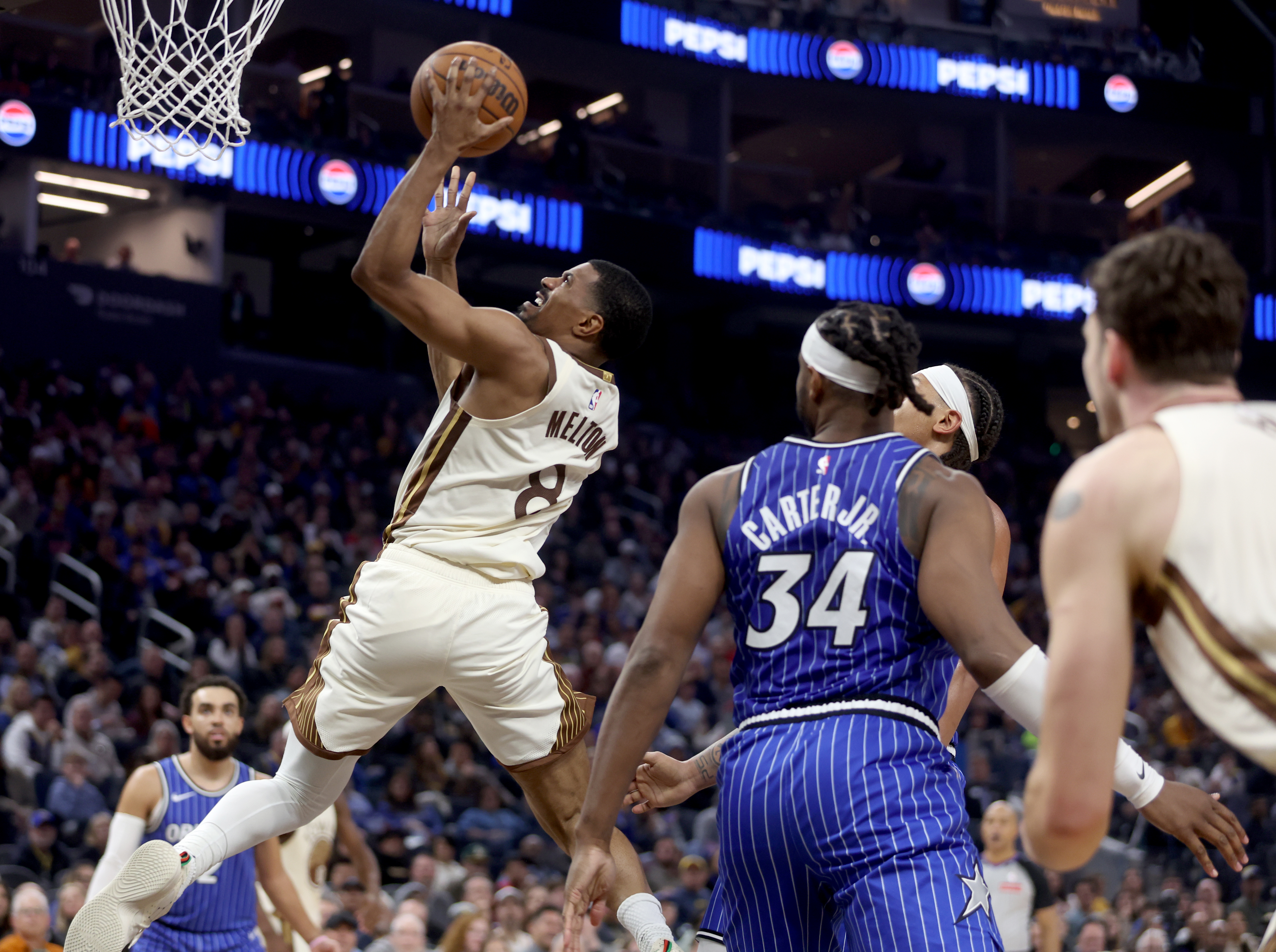 Golden State Warriors’ De’Anthony Melton #8 shoots a basket in...