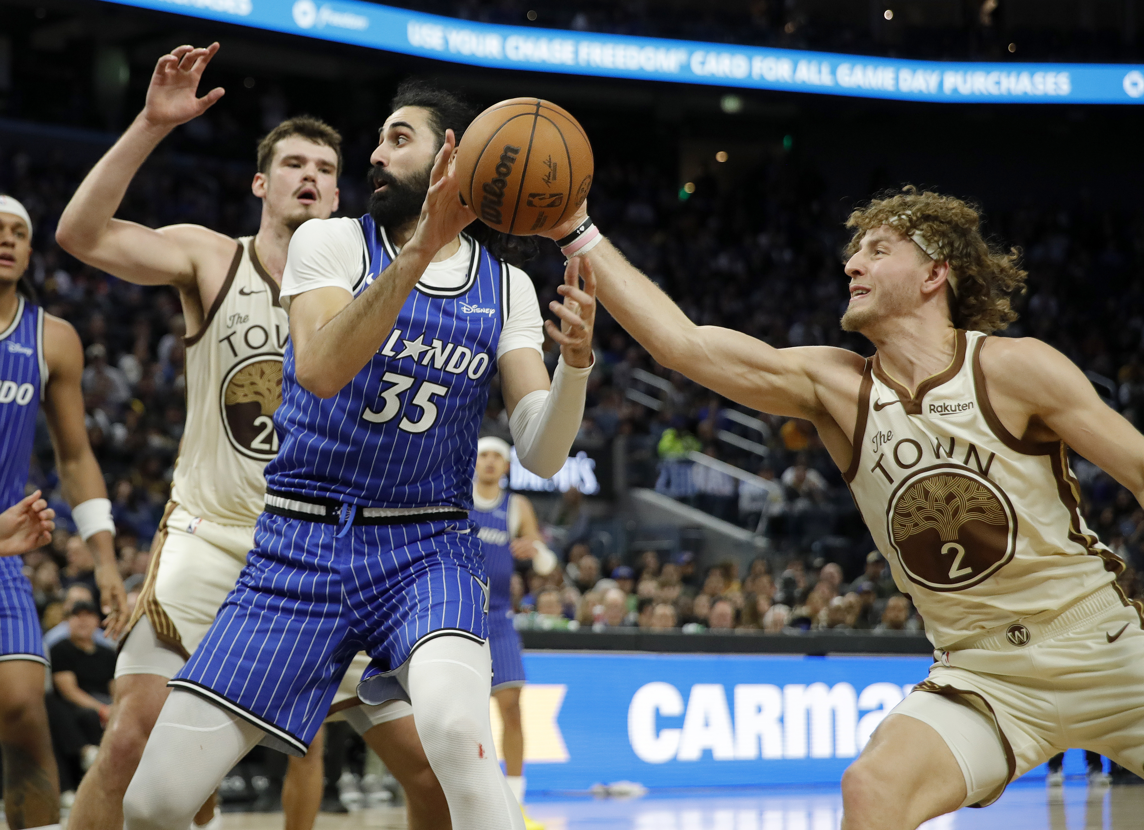 Golden State Warriors’ Brandin Podziemski #2 knocks the ball away...