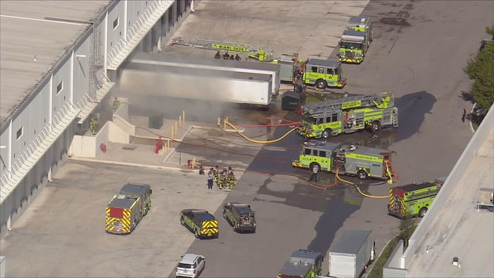 Crews battle warehouse fire in Medley