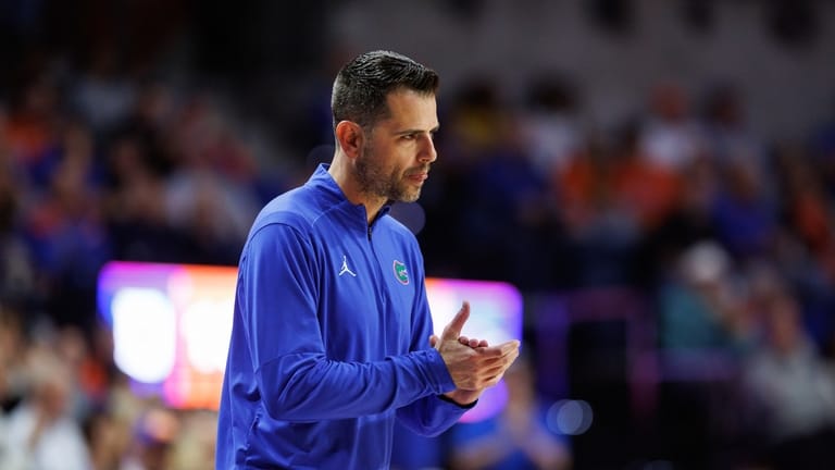 Florida head coach Todd Golden paces the sidelines during the...