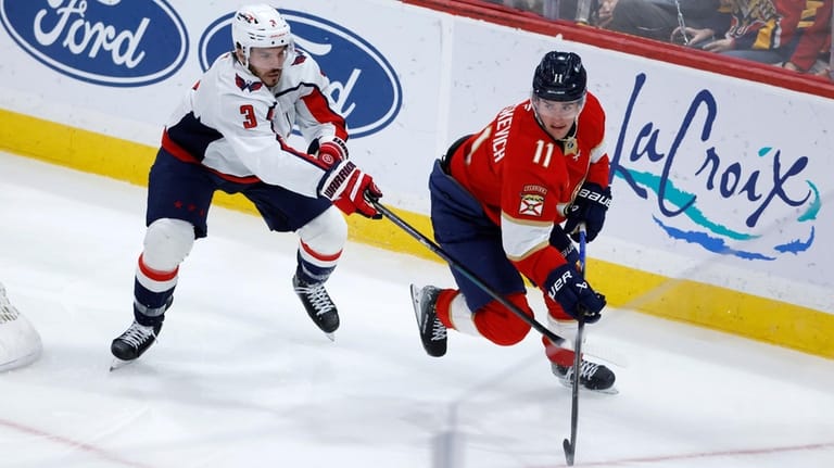 Washington Capitals defenseman Matt Roy (3) and Florida Panthers right...