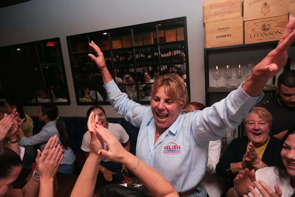 Ada Mesa celebrates after her daughter Gelien Perez won the Group 3 seat of the Hialeah City Council runoff election on Tuesday, Dec. 9, 2025, at Trigo Cafe Tapas Wine at 839 W 49th St. in Hialeah, Fla. 