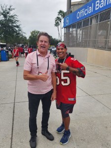 Greg D’Cruz with Tampa Bay sports media legend Rock Riley at Raymond James Stadium, home of the Tampa Bay Buccaneers