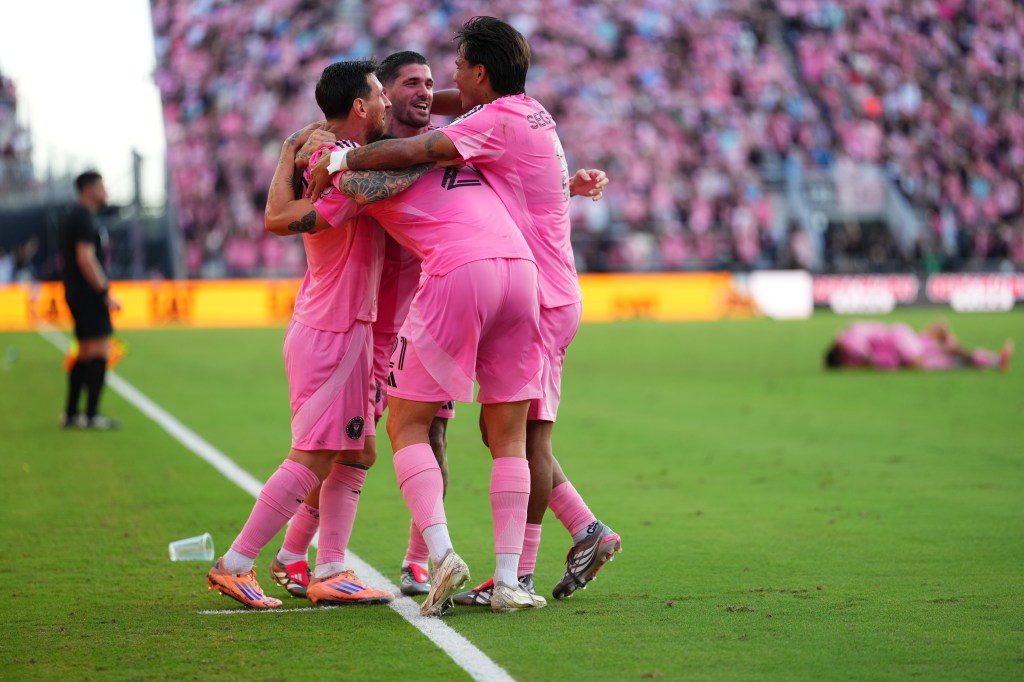 Tadeo Allende #21 of Inter Miami CF celebrates with teammates after scoring the team's third goal during the Audi 2025 MLS Cup Final match between Inter Miami CF and Vancouver Whitecaps FC at Chase Stadium on December 06, 2025 in Fort Lauderdale, Florida.