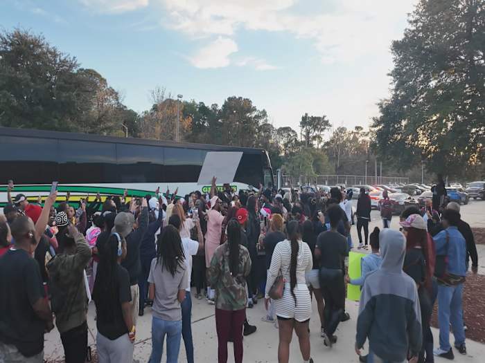 Thousands celebrate return of Raines Vikings to Jacksonville with state champion title