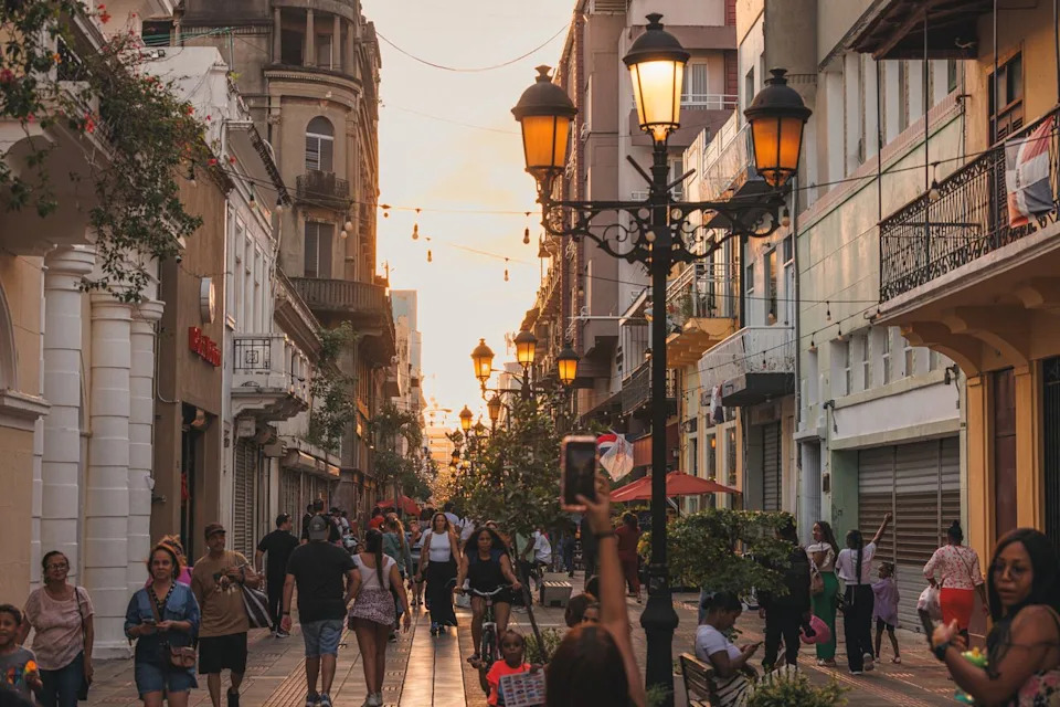 Stephanie Pollak/Travel + Leisure A pedestrian street in Santo Domingo at sunset.