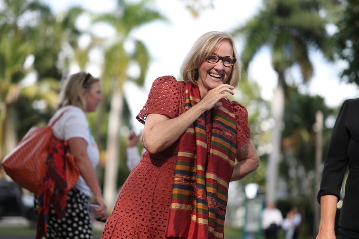 Eileen Higgins speaks with supporters before canvassing a neighborhood for votes on Dec. 8, 2025 in Miami, Florida.