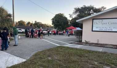 Families wait for Dr. Piper Center Christmas Day Celebration | Lee County
