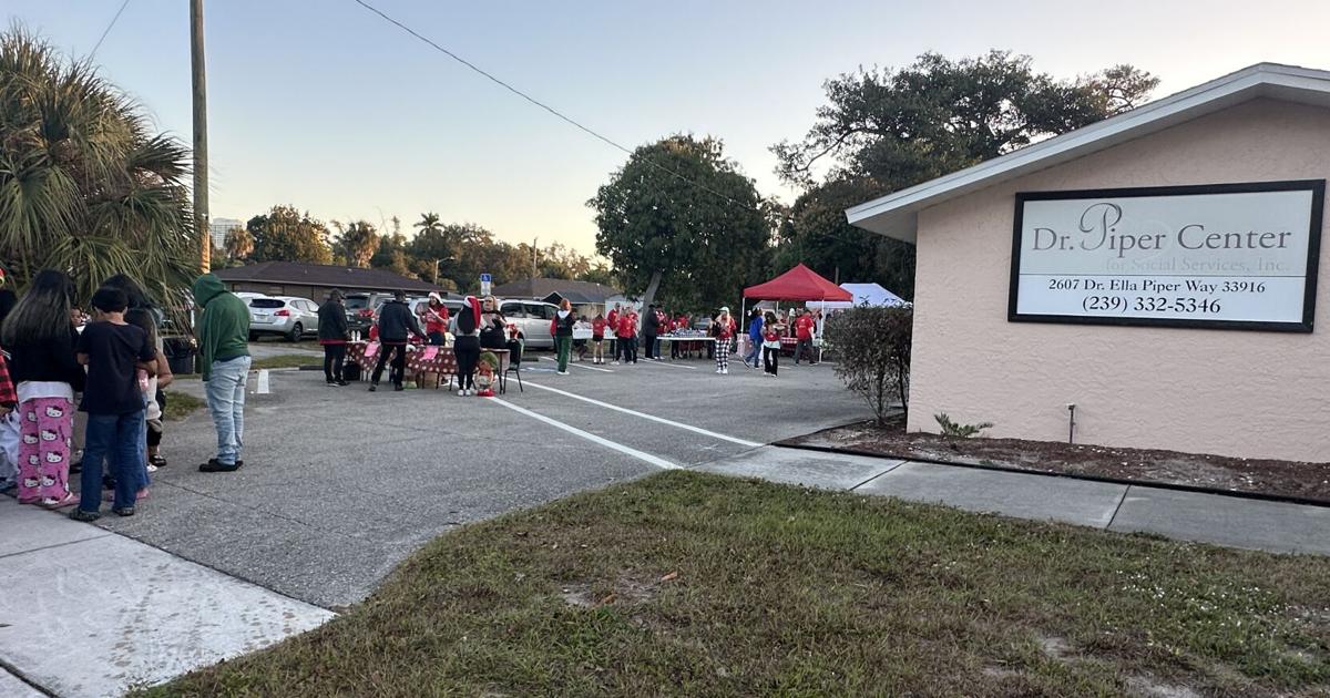 Families wait for Dr. Piper Center Christmas Day Celebration | Lee County