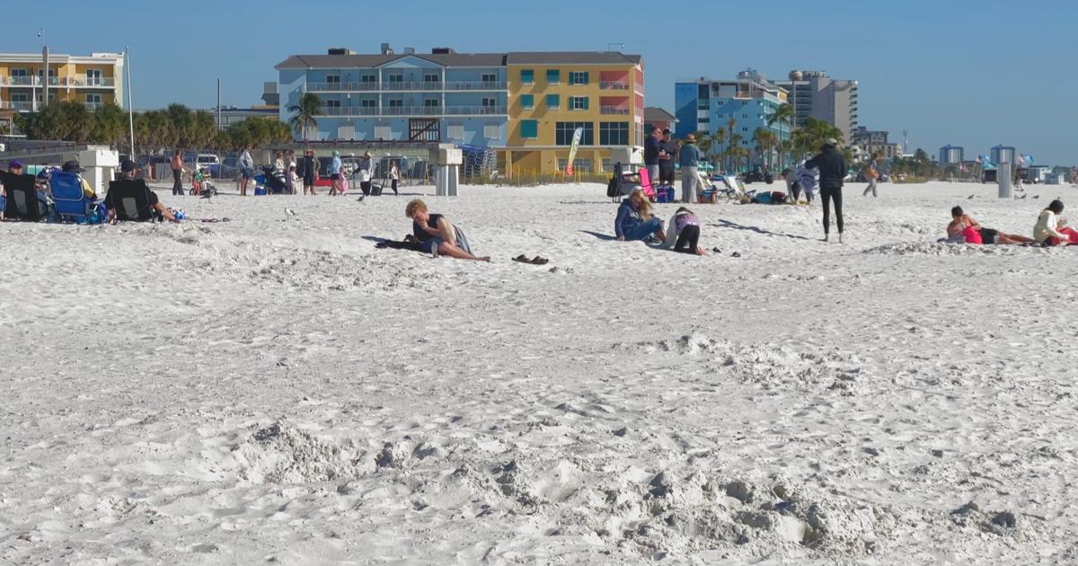 Fort Myers Beach visitors embrace sun on a cold beach day | Lee County
