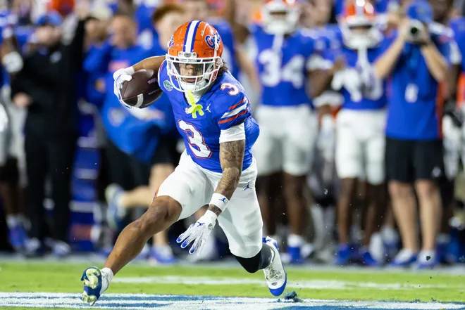 Oct 19, 2024; Gainesville, Florida, USA; Florida Gators wide receiver Eugene Wilson III (3) runs with the ball against the Kentucky Wildcats during the first half at Ben Hill Griffin Stadium. Mandatory Credit: Matt Pendleton-Imagn Images