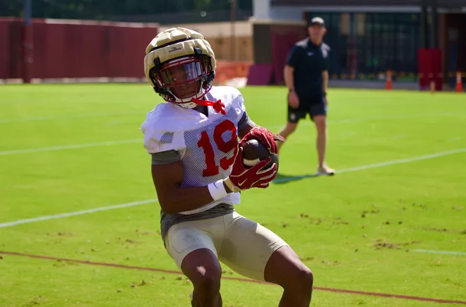 FSU football's Micahi Danzy makes a catch in the first practice of preseason camp on Wednesday, July 30, 2025