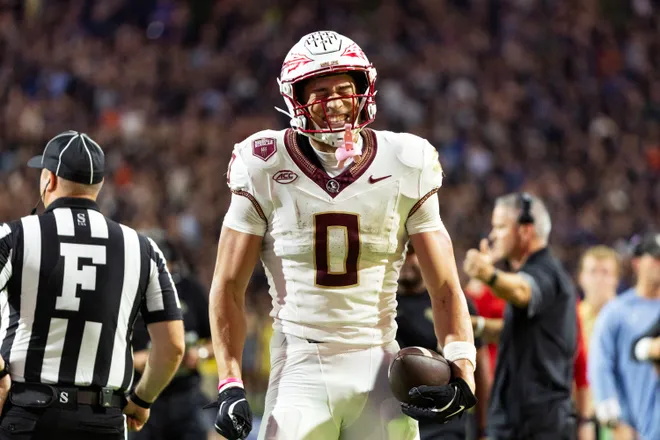 CHARLOTTESVILLE, VIRGINIA - SEPTEMBER 26: Duce Robinson #0 of the Florida State Seminoles celebrates a reception in the first half during a game against the Virginia Cavaliers at Scott Stadium on September 26, 2025 in Charlottesville, Virginia. (Photo by Ryan M. Kelly/Getty Images)