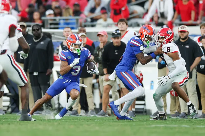 Nov 1, 2025; Jacksonville, Florida, USA; Florida Gators wide receiver Eugene Wilson III (3) runs with the ball in the second half against the Georgia Bulldogs at EverBank Stadium. Mandatory Credit: Matt Pendleton-Imagn Images