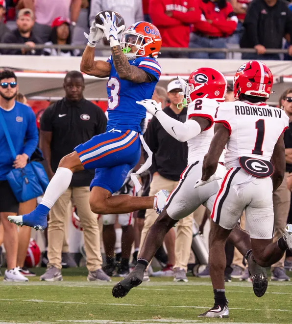 Florida Gators wide receiver Eugene Wilson III (3) catches a pass in the second half in an NCAA football game, Saturday, Nov. 1, 2025, at EverBank Stadium in Jacksonville, Fla. Georgia defeated Florida 24-20. [Doug Engle/Florida Times-Union]