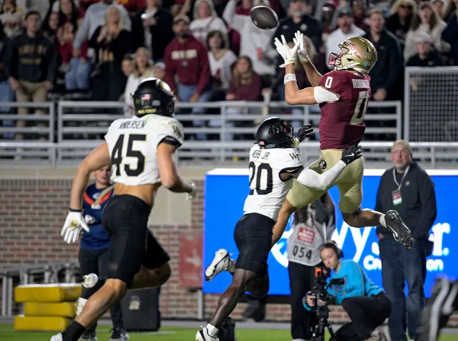 Nov 1, 2025; Tallahassee, Florida, USA; Florida State Seminoles wide receiver Duce Robinson (0) catches a pass during the second half against the Wake Forest Demon Deacons at Doak S. Campbell Stadium. Mandatory Credit: Melina Myers-Imagn Images