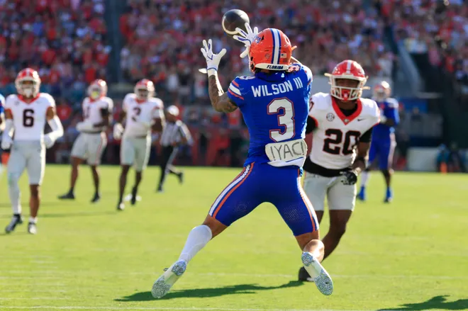 Florida Gators wide receiver Eugene Wilson III (3) catches a pass for a touchdown score during the first quarter of an NCAA football game, Saturday, Nov. 1, 2025, at EverBank Stadium in Jacksonville, Fla. Georgia held off Florida 24-20. [Corey Perrine/Florida Times-Union]
