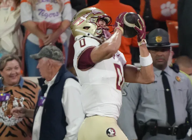 Florida State University receiver Duce Robinson (0) catches a ball warming up before kickoff at Memorial Stadium in Clemson Saturday, November 8, 2025.