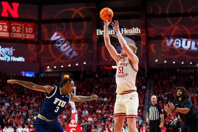 Nov 8, 2025; Lincoln, Nebraska, USA; Nebraska Cornhuskers forward Rienk Mast (51) shoots a three point basket against Florida International Panthers forward Corey Stephenson (3) during the first half at Pinnacle Bank Arena.