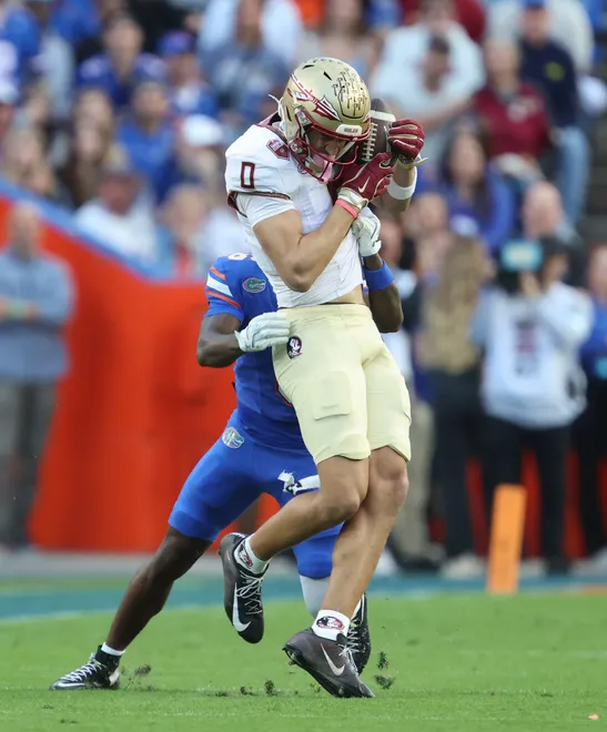 Florida State wide receiver Duce Robinson (0) makes a catch during the first half of an NCAA football game at Steve Spurrier Field at Ben Hill Griffin Stadium in Gainesville, FL on Saturday, November 29, 2025. [Alan Youngblood/Gainesville Sun]
