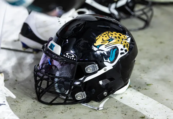 Nov 23, 2025; Glendale, Arizona, USA; Detailed view of a Jacksonville Jaguars helmet at State Farm Stadium. Mandatory Credit: Mark J. Rebilas-Imagn Images