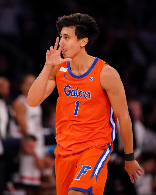 NEW YORK, NEW YORK - DECEMBER 09: Xaivian Lee #1 of the Florida Gators celebrates his three-point basket against the UConn Huskies in the first half at Madison Square Garden on December 09, 2025 in New York City. (Photo by Evan Bernstein/Getty Images)