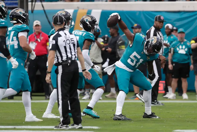 Dec 14, 2025; Jacksonville, Florida, USA; Jacksonville Jaguars linebacker Ventrell Miller (51) reacts after intercepting the ball against the New York Jets during the fourth quarter at EverBank Stadium. Mandatory Credit: Travis Register-Imagn Images
